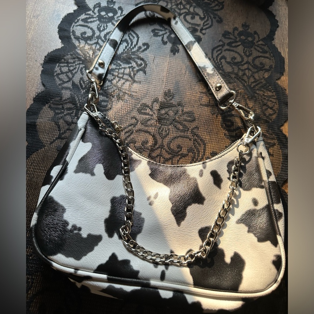 Cow print purse with chain